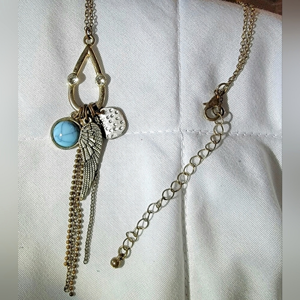 Long dangling charm necklace